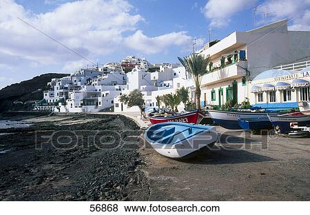 Boats and houses on the coast View Large Photo Image Stock Photo - Boats and houses on the coast . Fotosearch