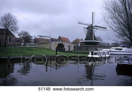 Boats in canal, Canal Gracht, Friesland, Netherlands  View Large Photo Image Stock Photo - Boats in canal, Canal Gracht, Friesland, Netherlands . Fotosearch