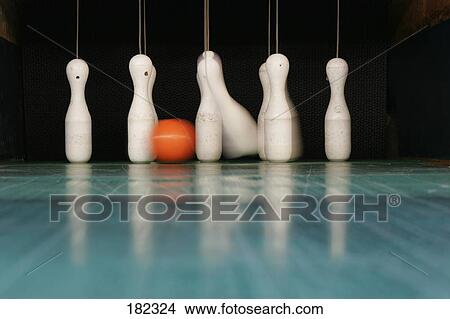 Bowling ball and pins at bowling alley View Large Photo Image Picture - Bowling ball and pins at bowling alley . Fotosearch