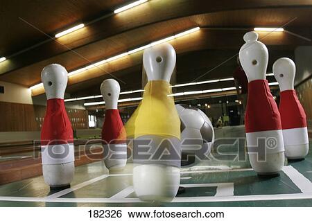 Stock Photograph - Bowling ball and pins at bowling alley . Fotosearch