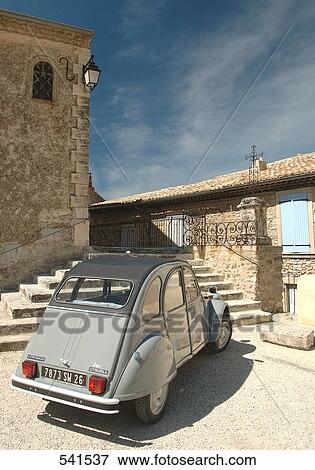 Car in front of church, Nyons, Drome, Rhone-Alpes, France View Large Photo Image Stock Photo - Car in front of church, Nyons, Drome, Rhone-Alpes, France . Fotosearch