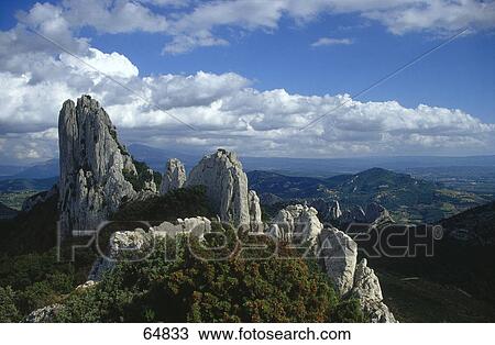 Stock Image - Cliffs of mountains, Dentelles De Montmirail, Provence-Alpes-Cote d'Azur, France . Fotosearch