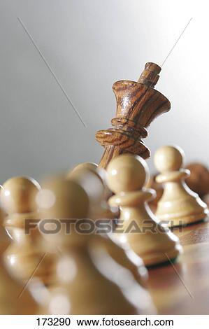 Close-up of chess pieces on chessboard View Large Photo Image Stock Image - Close-up of chess pieces on chessboard . Fotosearch