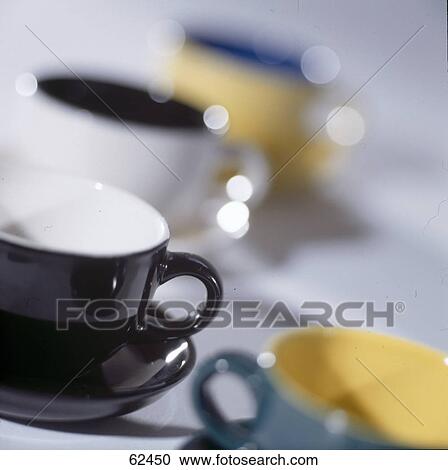Close-up of coffee cups and saucers View Large Photo Image Stock Image - Close-up of coffee cups and saucers . Fotosearch