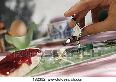Close-up of figurine of soccer player View Large Photo Image Stock Image - Close-up of figurine of soccer player . Fotosearch