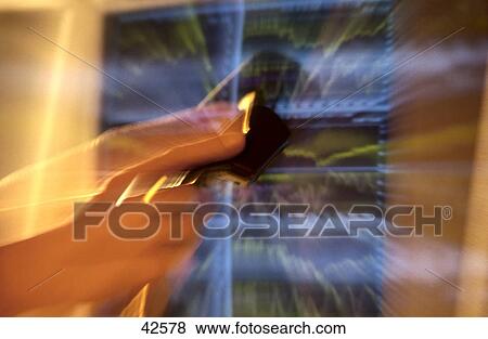 Close-up of person's hand holding telephone receiver View Large Photo Image Stock Photo - Close-up of person's hand holding telephone receiver . Fotosearch