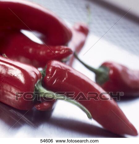 Close-up of red chilli peppers View Large Photo Image Stock Photograph - Close-up of red chilli peppers . Fotosearch