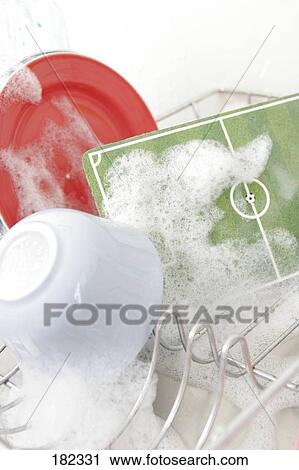 Close-up of soap sun on plate and bowl View Large Photo Image Stock Image - Close-up of soap sun on plate and bowl . Fotosearch