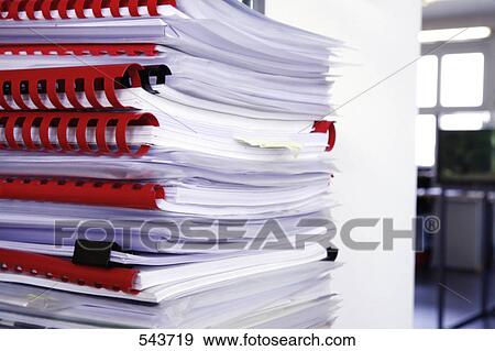 Stock Photo - Close-up of stack of spiral notebooks . Fotosearch