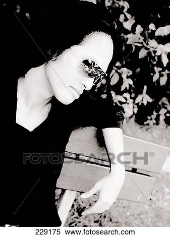 Stock Photography - Close-up of young man looking serious . Fotosearch