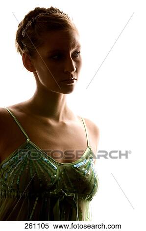 Close-up of young woman looking serious View Large Photo Image Stock Photography - Close-up of young woman looking serious . Fotosearch