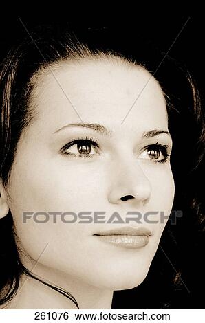 Close-up of young woman View Large Photo Image Stock Photograph - Close-up of young woman . Fotosearch