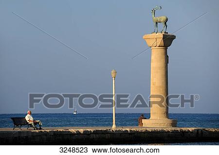 Column with stag statue at the port entrance of Rhodes, Greece View Large Photo Image Stock Image - Column with stag statue at the port entrance of Rhodes, Greece . Fotosearch