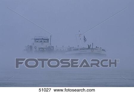 Stock Photo - Container ship in river, Rhine River, Bingen, Germany . Fotosearch