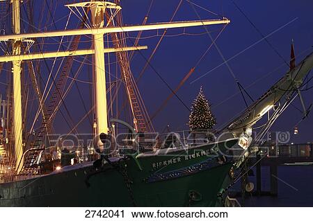 Cruise ship at lit up port during dusk, Hamburg, Germany View Large Photo Image Stock Image - Cruise ship at lit up port during dusk, Hamburg, Germany . Fotosearch