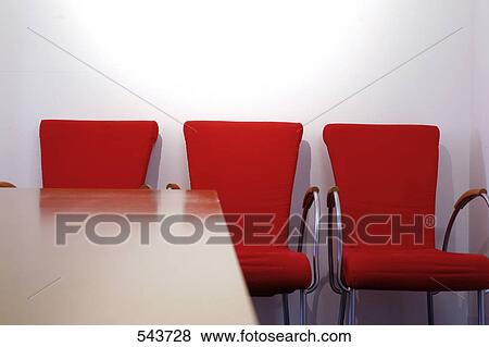 Empty chairs at table View Large Photo Image Stock Photo - Empty chairs at table . Fotosearch