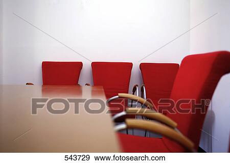 Stock Photo - Empty chairs at table . Fotosearch