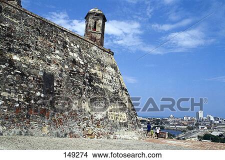 Picture - Family walking near old castle, Castillo De San Felipe De Barajas, Cartagena, Colombia . Fotosearch