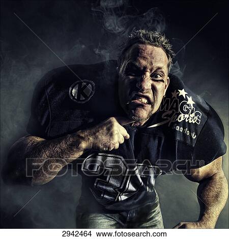 Picture - football player, portrait . Fotosearch