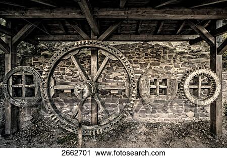 Gear wheel on wall of castle, Dreieichenhain Castle, Dreieich, Darmstadt, Hesse, Germany View Large Photo Image Stock Image - Gear wheel on wall of castle, Dreieichenhain Castle, Dreieich, Darmstadt, Hesse, Germany . Fotosearch