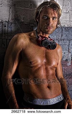 Halfnaked man looking at camera View Large Photo Image Stock Photo - Halfnaked man looking at camera . Fotosearch