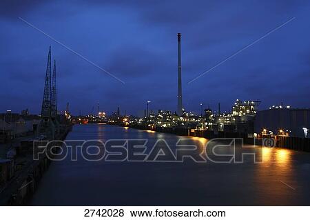 Stock Photo - Harbor lit up at night, Hamburg, Germany . Fotosearch
