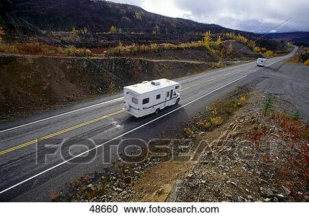 Stock Image - High angle view of camper on road, Klondike Highway, Yukon, Canada . Fotosearch