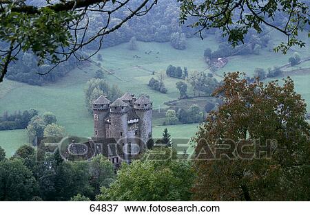 Stock Photo - High angle view of castle, Chateau D'Anjony, Tournemire, Cantal, France . Fotosearch