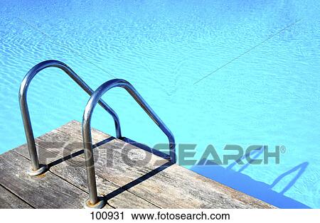 High angle view of hand rail at poolside View Large Photo Image Stock Image - High angle view of hand rail at poolside . Fotosearch