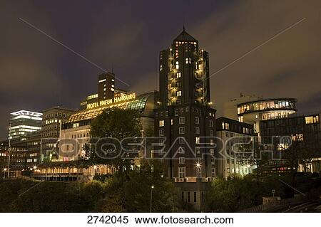 Hotel lit up at night, Hotel Hafen Hamburg, Astra Tower, Hamburg, Germany View Large Photo Image Stock Photography - Hotel lit up at night, Hotel Hafen Hamburg, Astra Tower, Hamburg, Germany . Fotosearch