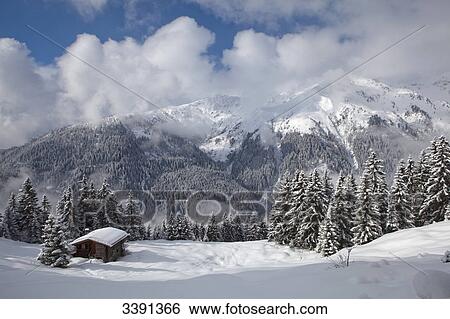 Stock Photograph - Hut in a winter landscape, elevated view . Fotosearch