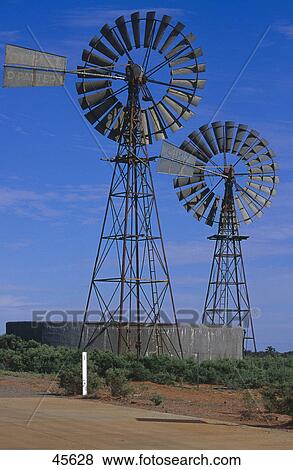 Industrial windmills in field, Australia View Large Photo Image Stock Photo - Industrial windmills in field, Australia . Fotosearch
