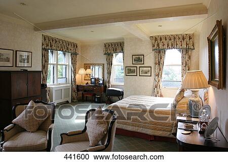 Stock Image - Interiors of bedroom, Ashford Castle, Ireland . Fotosearch