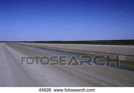 Stock Photograph - Irrigation canal of cotton farm, Menindee Lake System, Australia . Fotosearch