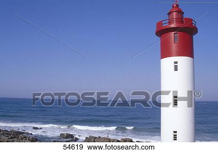Lighthouse on coast View Large Photo Image Stock Photo - Lighthouse on coast . Fotosearch