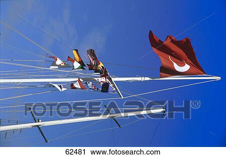Low angle view of national flags View Large Photo Image Stock Image - Low angle view of national flags . Fotosearch