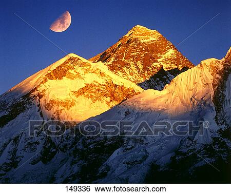 Stock Photograph - Moon over mountains, Mt Everest, Khumbu, Nepal . Fotosearch