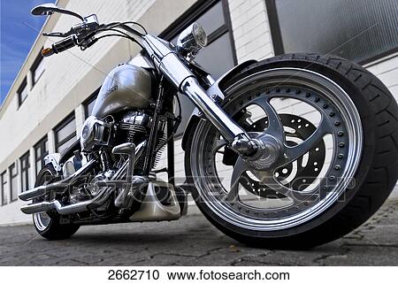 Stock Image - Motorbike on pavement . Fotosearch