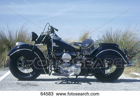 Motorbike parked at roadside View Large Photo Image Stock Image - Motorbike parked at roadside . Fotosearch