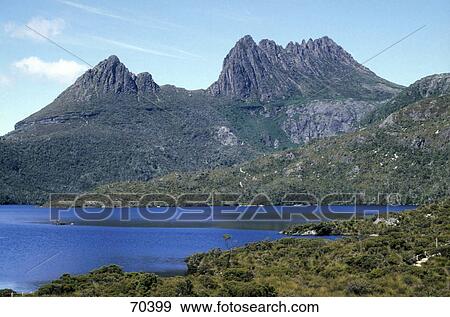 Mountain near lake, Lake St Clair National Park, Cradle Mountain, Tasmania, Australia  View Large Photo Image Stock Photo - Mountain near lake, Lake St Clair National Park, Cradle Mountain, Tasmania, Australia . Fotosearch