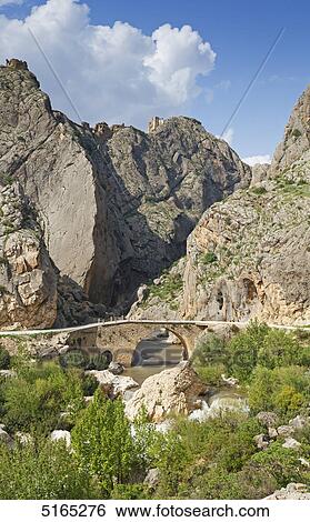 Stock Photograph - Mountains and Cendere Bridge, Anatolia, Turkey . Fotosearch