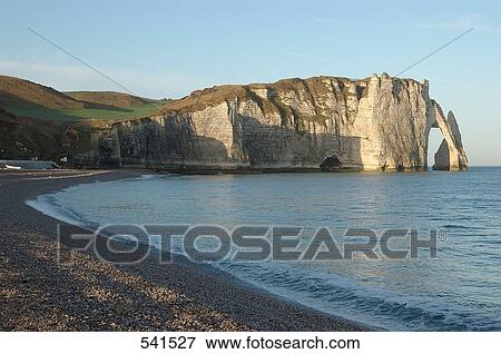 Stock Photo - Natural arch in sea, Etretat, Seine-Maritime, Haute-Normandy, France . Fotosearch