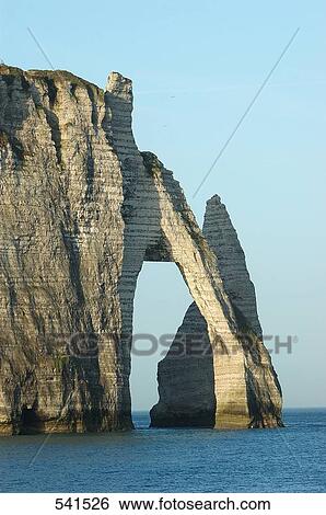 Natural arch in sea, Etretat, Seine-Maritime, Haute-Normandy, France View Large Photo Image Stock Photograph - Natural arch in sea, Etretat, Seine-Maritime, Haute-Normandy, France . Fotosearch