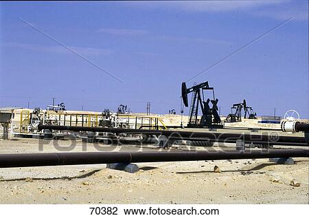 Oil pump in field, Jiddat al-Harasis, Oman, United Arab Emirates View Large Photo Image Stock Image - Oil pump in field, Jiddat al-Harasis, Oman, United Arab Emirates . Fotosearch