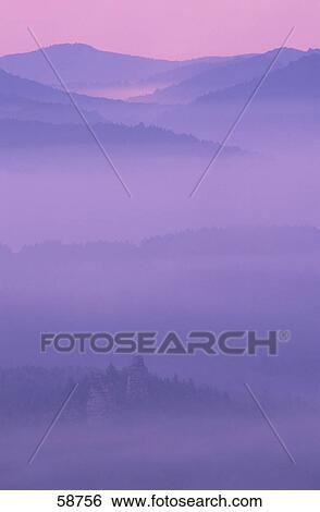 Stock Photograph - Panoramic view of mountain range . Fotosearch