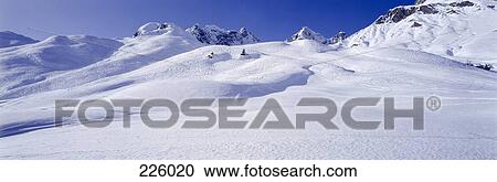 Panoramic view of snow-covered landscape, Austria View Large Photo Image Stock Image - Panoramic view of snow-covered landscape, Austria . Fotosearch
