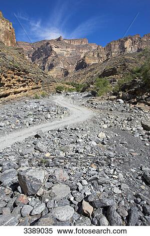 Path through a rocky landscape View Large Photo Image Stock Photography - Path through a rocky landscape . Fotosearch