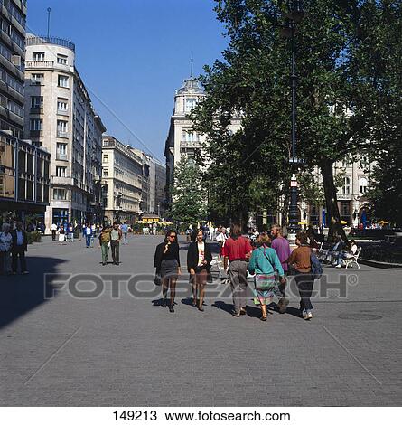 People walking on sidewalk View Large Photo Image Stock Image - People walking on sidewalk . Fotosearch