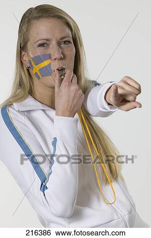 Portrait of female soccer fan whistling View Large Photo Image Stock Photograph - Portrait of female soccer fan whistling . Fotosearch
