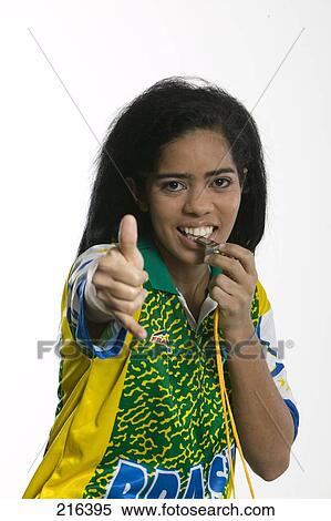 Portrait of female soccer fan whistling View Large Photo Image Stock Photography - Portrait of female soccer fan whistling . Fotosearch